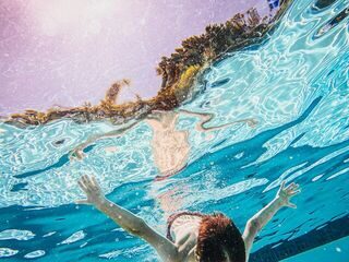 Can Salt Water Pool Turn Hair Green? Prevention & Solutions